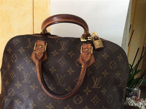 does louis vuitton refurbish handbags.